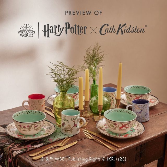 the table is set with dishes, cups and candles for harry potter's cahi klaston