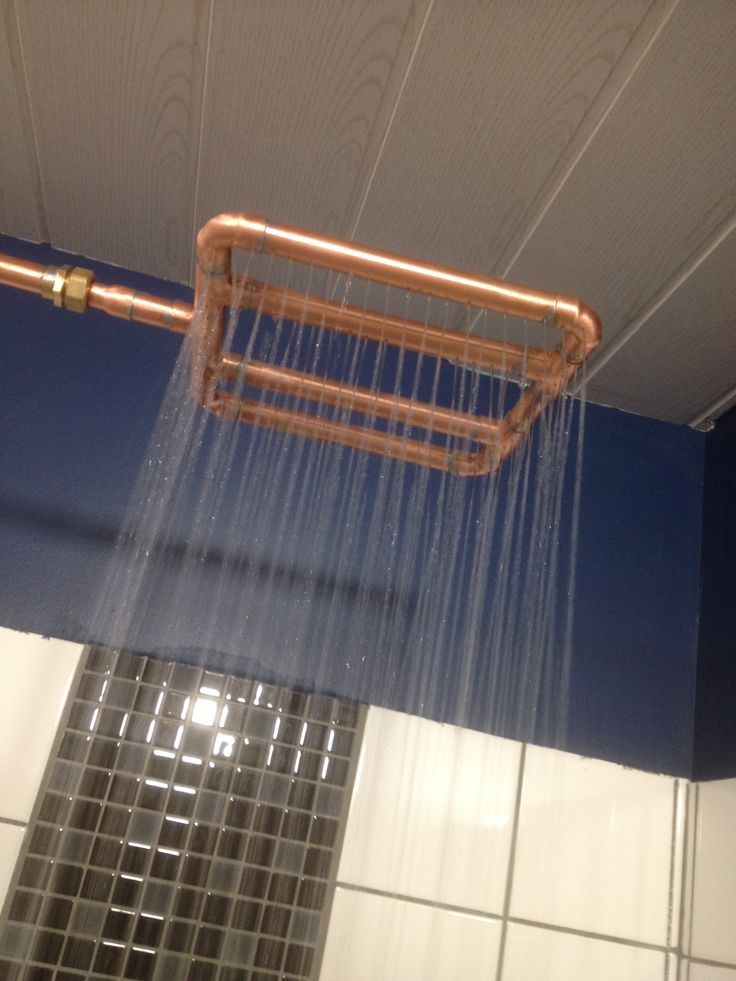 a shower head with water flowing from it