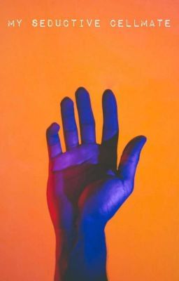 a person's hand with their fingers up against an orange and blue background stock photo