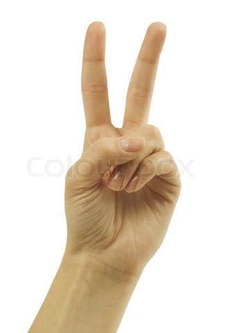 a person making the peace sign with their hand