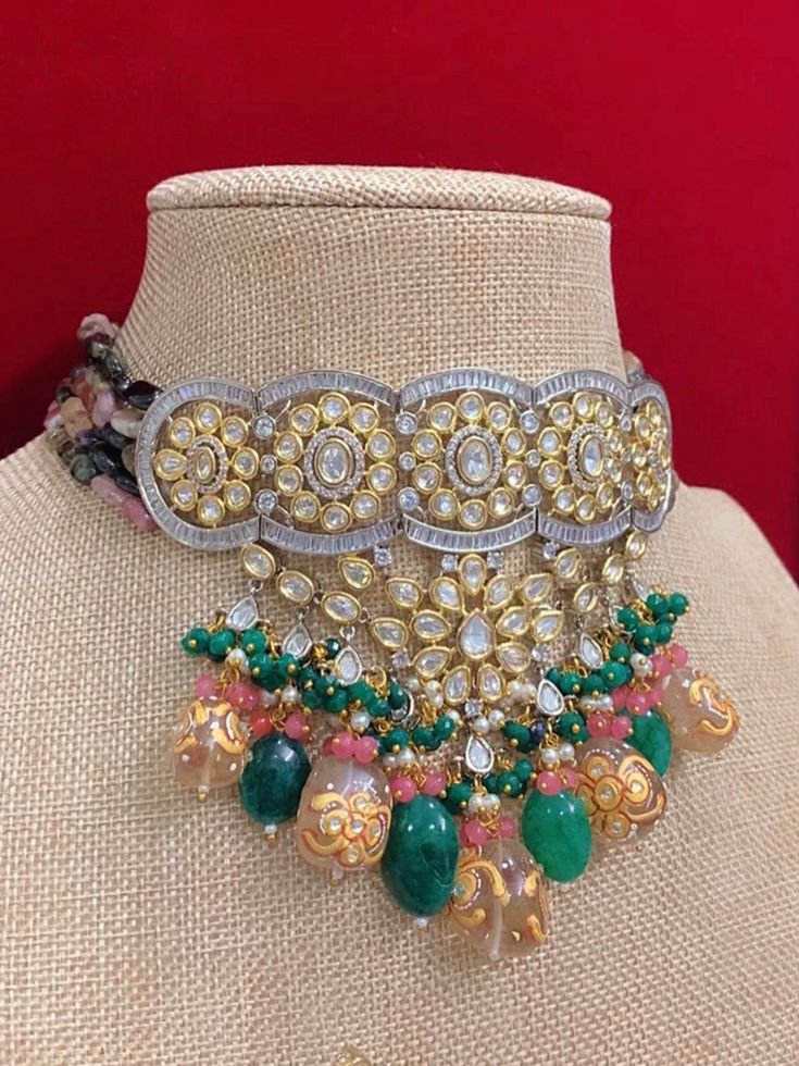 Premium quality Designer piece. American diamond lining . Uncut foil kundan, crystal beads, tumble beads . Glass quartz band work. widest part of the choker is about 2 inch. Beaded part sits in the neck in V shape. Comes with matching kundan earring . Oversize about 5.5 inch long . Light weight , push back . Kundan Beaded Choker For Parties, Bollywood Style Kundan Beaded Choker, Jeweled Kundan Choker Necklace, Party Kundan Cutdana Choker Necklace, Multicolor Kundan Choker, Multicolor Kundan Bridal Choker Necklace, Kundan Beaded Choker Necklace, Beaded Kundan Choker Necklace, Chandbali Mirror Work Choker For Festivals