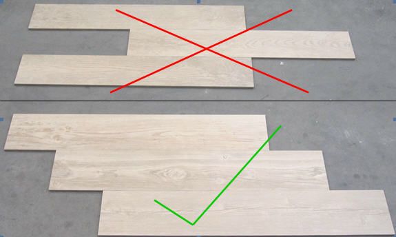 two pieces of wood with red and green arrows pointing to the same direction on each side