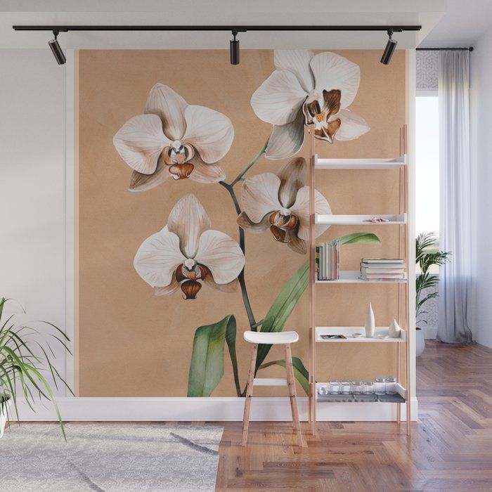 the wall mural is decorated with white orchids