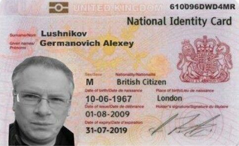 an id card with the image of a man in glasses