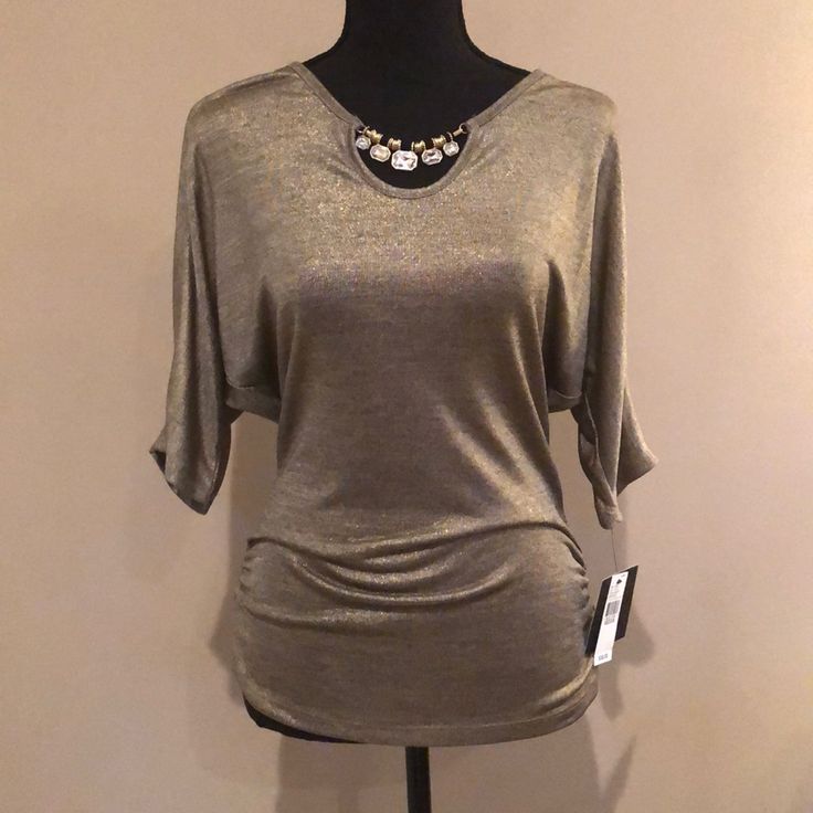 Jeweled Neck Open Arm Blouse. Shimmer Golden Pewter Material. Gathered On Sides. Nwt. Gold Short Sleeve Tops For Formal Occasions, Gold Fitted Casual Blouse, Gold Tops For Night Out In Spring, Gold Blouse For Night Out, Gold Tops For Summer Formal Events, Chic Gold Stretch Top, Casual Gold Blouse For Party, Gold Stretch Blouse For Fall, Chic Gold Short Sleeve Top