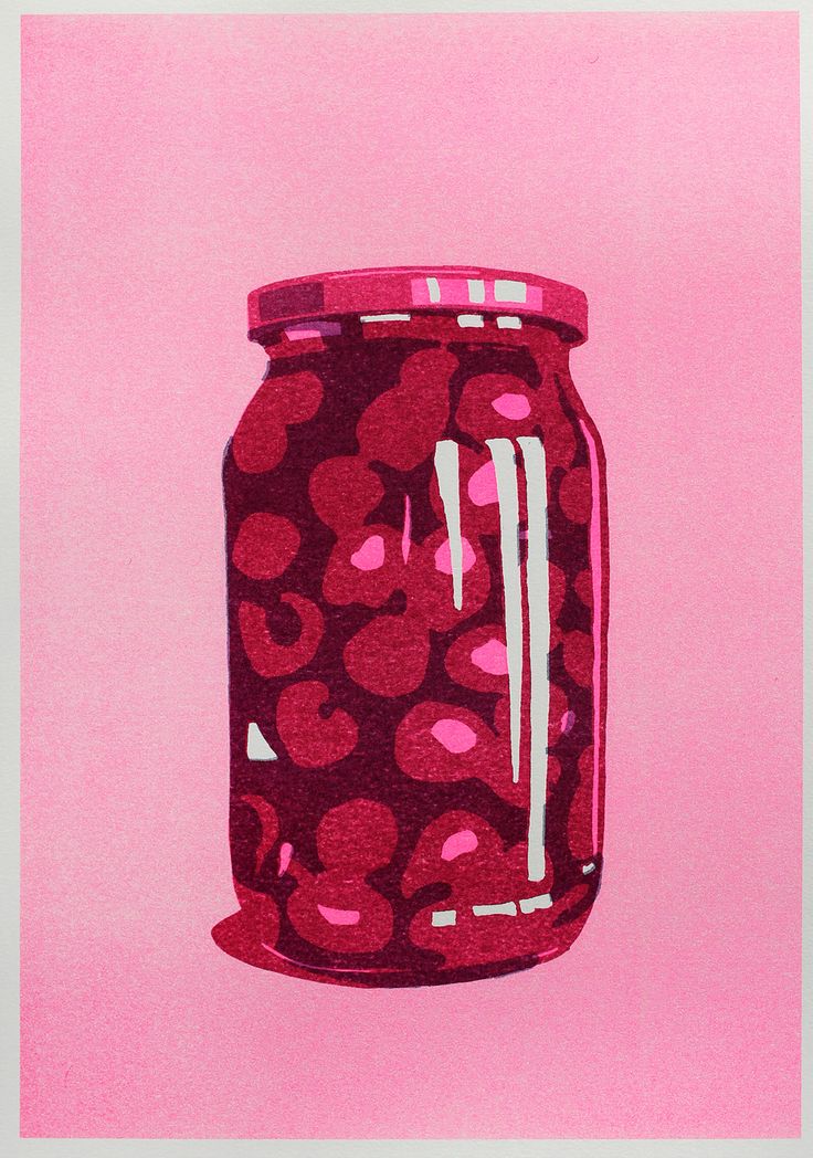 a pink background with a red and white polka dot jar