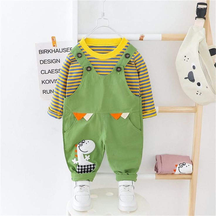 Boys Stripe Cute Dino Cartoon Top & Jumpsuit - PrettyKid Green Cotton Sets With Cartoon Print, Green Long Sleeve Onesie For Spring, Green Cartoon Print Sets For Spring, Green Playful Bodysuit For Playtime, Spring Cartoon Print Jumpsuits And Rompers For Playtime, Spring Playtime Cartoon Print Jumpsuits And Rompers, Long Sleeve Green Onesie For Playwear, Playful Cotton Long Sleeve Jumpsuits And Rompers, Green Long Sleeve Onesie For Playwear