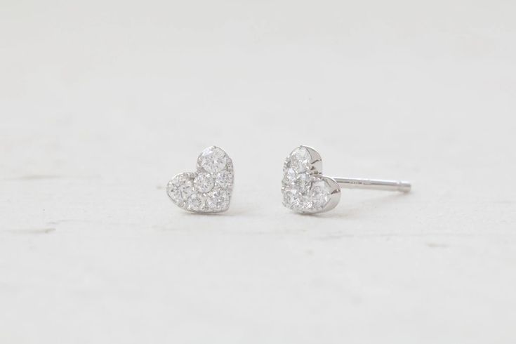 These cute diamond heart studs features 6 round cut diamonds set in a heart shape making it dainty yet sparkly. Pair it with your favorite earrings for a stack or wear it alone for everyday. Heart Diamond, Heart Studs, Diamond Heart, Diamond Studs, Round Cut Diamond, Heart Shape, A Heart, Round Cut, Heart Shapes