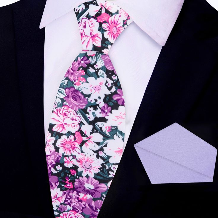 This silk necktie in shades of pink with white and dark green floret patterns blends a touch of whimsy with classic elegance. The soft pink base is beautifully contrasted by the white and dark green floret design, adding a unique visual texture that feels both fresh and sophisticated. This tie is perfect for occasions where a refined yet lively look is desired. Dress Shirts: White Dress Shirt: A white dress shirt highlights the vibrant pink and floret pattern of the tie, creating a crisp and cle Classic Formal Ties With Floral Print, Elegant Floral Print Ties For Gifts, Elegant Floral Print Accessories For Black Tie, Elegant Floral Print Ties As A Gift, Elegant Floral Print Ties As Gift, White Floral Print Tie For Formal Occasions, Elegant Multicolor Floral Print Suit And Tie Accessories, Elegant Floral Print Ties For Spring, Elegant Floral Print Summer Ties