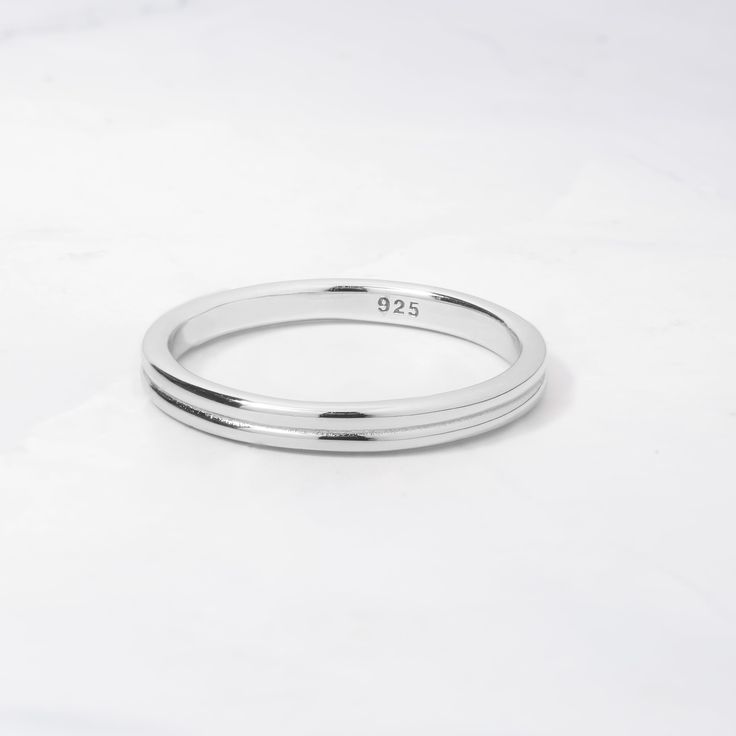 This is a sweet and simple ring that is perfect for a minimalist look, stacked with other rings, or as a simple wedding band. Made of 925 Sterling Silver Available in 14k Gold or Rhodium Plating We use a THICK 14k Gold plating - for a piece that will last you years to come! VERY HIGH QUALITY Available in sizes 4-12 Ring Height: 2.4mm Ring Sizer Simple Wedding Band, Double Band Ring, Simple Wedding Bands, Double Band Rings, Simple Ring, Stacked Jewelry, Initial Jewelry, Statement Bracelet, Sapphire Jewelry