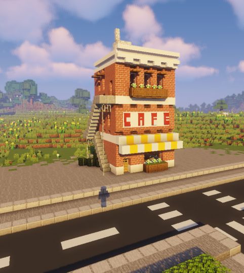 an image of a building that is made out of legos and has the words cafe on it