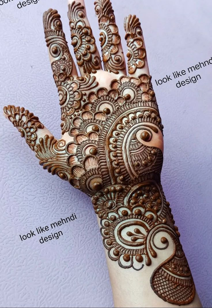 a hand with henna designs on it and instructions for how to do the henna