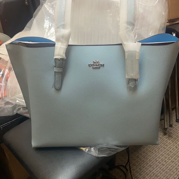 Coach Mollie Tote Large Size. Brand New, Never Used.Price Is Firm Light Blue Double Handle Bag With Top Carry Handle, Blue Crossbody Bag With Dust Bag Included, Blue Tote Bag With Top Carry Handle, Light Blue Tote Shoulder Bag With Top Carry Handle, Blue Shopping Bag With Top Carry Handle, Light Blue Satchel Bag For Shopping, Light Blue Travel Tote Bags, Light Blue Top Handle Bag, Light Blue Shoulder Bag For Shopping