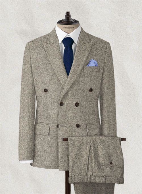 Look sharp and catch attention with the Light Weight Brown Tweed Suit which is a must-have when it comes to refreshing your wardrobe. Crafted from 100% wool, the coarse tweed fabric is distinctive with bright colored flecks splattered all along the surface giving the suit a distinct darker color that creates a sumptuous finish which is unrivalled in quality. #studiosuits #mensclothigstyle #tweed #brown #mensstyle #stylishmen #mensoutfits #mensattire Formal Tailored Wool Tweed Dress, Double-breasted Tweed Jacket For Business Casual, Tailored Wool Tweed Dress For Formal Occasions, Tweed Herringbone Suit For Tailoring, Tailored Classic Wool Tweed Dress, Fitted Wool Double Breasted Suit For Winter, Fitted Wool Double-breasted Tweed Jacket, Fitted Double-breasted Wool Tweed Jacket, Fitted Tweed Dress For Business