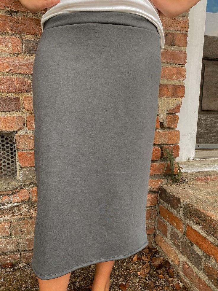 These pencil skirts are exclusive to Ada Faye. We designed these pencil skirts with YOU in mind! - Super comfy and great for business casual Color Disclaimer: Actual colors may vary due to computer monitors. *Measurements are taken flat, and then doubled.* Size 1X 2X 3X Waist 41" 43" 45" Hips 44" 46" 48" Length 30" 30.5" 31" Casual Fitted Plain Skirt, Stretch Gray Skirt With Lining, Casual Gray Pencil Skirt, Gray Lined Pencil Skirt Bottoms, Casual Solid Knee-length Pencil Skirt, Casual Stretch Midi Pencil Skirt, Office Pencil Skirt In Solid Color, Stretch Knee-length Pencil Skirt In Solid Color, Casual Stretch Pencil Skirt In Solid Color