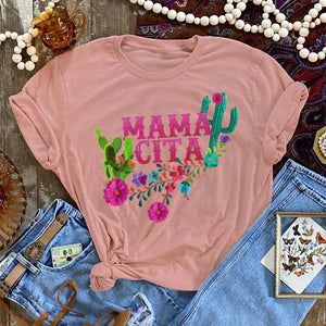 Hola, Mamacita! We dig a well-designed tee! We love the peachy color of this tee and the vibrant color of the floral print. Lovely! Such a fun tee for year-round wear for the mamacitas out there! 100% cotton Fits true to size Available from Small - XLarge Charlie 1 Horse Hat, Cactus Graphic, Mexican Outfit, Mexican Designs, Desert Rose, Fun Prints, Ladies Boutique, Cool Tees, Stylish Design