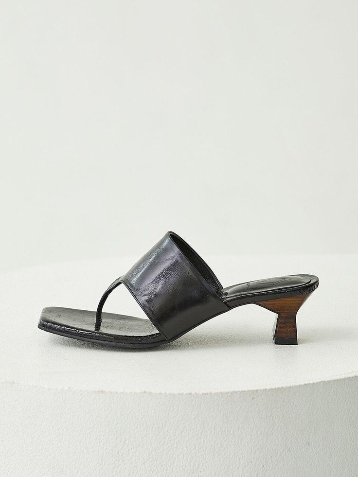 Editor's NotesTheseelegant flip flop sandals are elegant and easy to style- Flip flop sandals- Subtle luster of washed leather- Wooden heels- Square toe- Kitten heelsMeasuremets(in.)- Size: KR220(US5) - KR255(US8.5)- Heel height: 2in.- Fits true to the sizeComposition & Care- Cowhide- Lining: Pig skin- Avoid moisture- Partial clean with a leather cleanerDesigner- Made in Korea- by Byeuuns Summer Open Toe Kitten Heels With Leather Sole, Open Toe Leather Kitten Heels With Wooden Heel, Leather Open Toe Kitten Heels With Wooden Heel, Leather Open-toe Kitten Heels With Wooden Heel, Single Toe Strap Kitten Heels With Leather Sole, Summer Leather Kitten Heels With Leather Sole, Kitten Heels With Leather Sole And Single Toe Strap, Summer Kitten Heels With Leather Sole, Sleek Sandals With Almond Toe And Deep Heel Cup