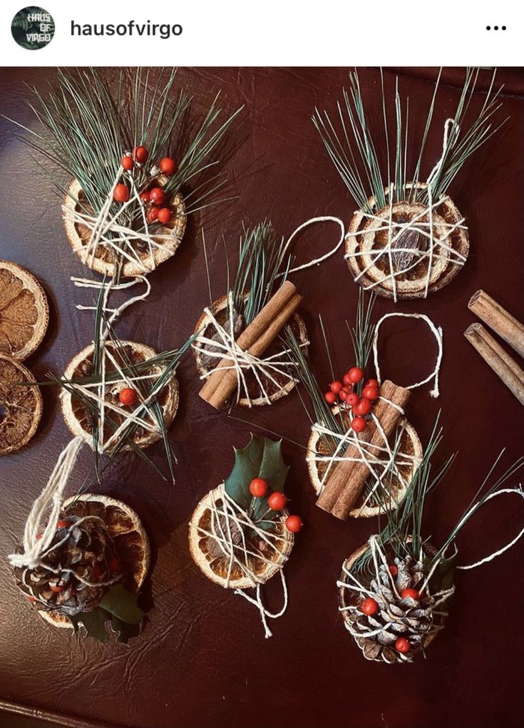 christmas decorations made out of cinnamon sticks and twine