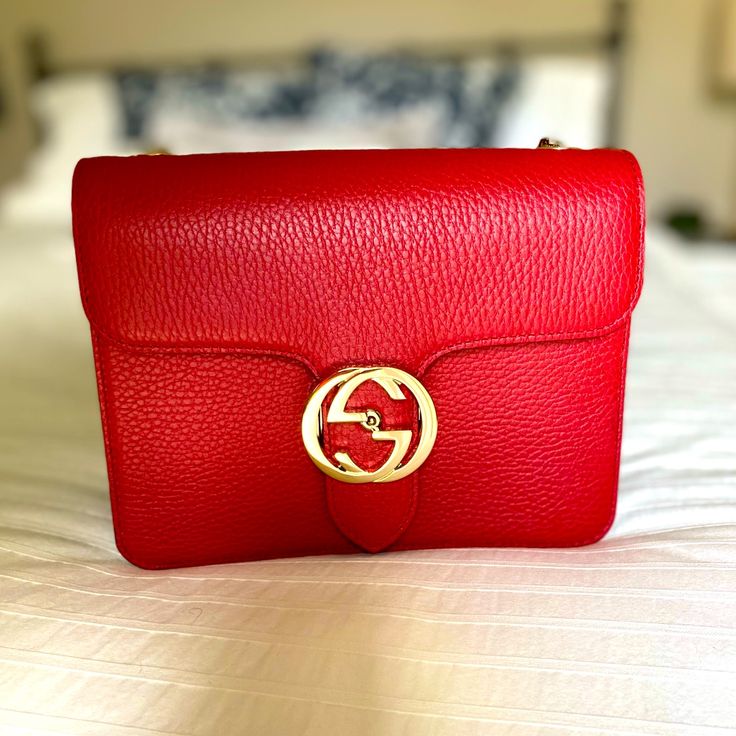 Brand New, Never Used Still With Packaging, Dust Bag And Box Red Shoulder Bag With Gold Hardware Length- 8” Height- 6.25” Gucci Dollar Calfskin Interlocking, Luxury Red Shoulder Bag With Cc Turnlock Closure, Luxury Red Shoulder Bag With Turn-lock Closure, Red Shoulder Bag, Bags Gucci, Gucci Bags, Continental Wallet, Gold Hardware, Calf Skin