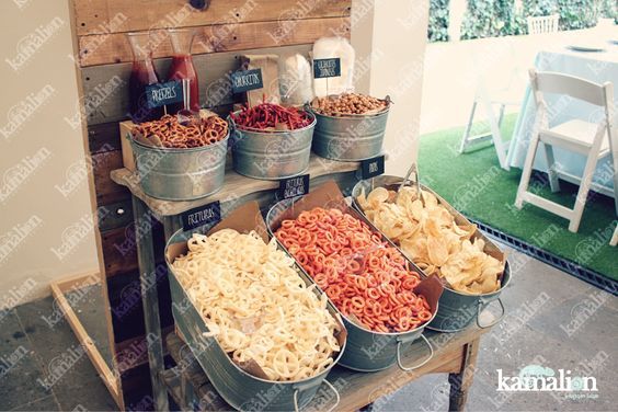 several buckets filled with different types of food