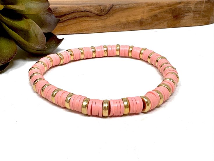 Handmade item * Materials * ----------------- 6x2mm Clay Heishi Beads * Dimensions * -------------------- Length:  7"  Width:  .25" * Details * ------------- Feminine stretch bracelet made with thin clay heishi beads in a dusty rose pink separated by plastic gold beads strung on stretchy bead cord.  Bracelet can be worn separately or stacked with your other favorites.  Keep up to date with new products by following me on social media  Instagram: @UtterlyAccessorized Facebook: UtterlyAccessorized Clay Bead Bracelets, Dusty Rose Pink, Clay Bead, Cord Bracelet, Bead Bracelets, Heishi Beads, Bead Stringing, Clay Beads, Friendship Bracelet