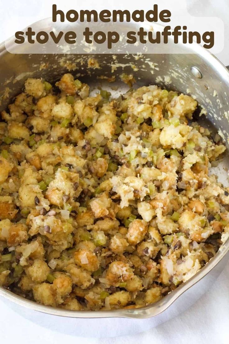 a pan filled with stuffing sitting on top of a table