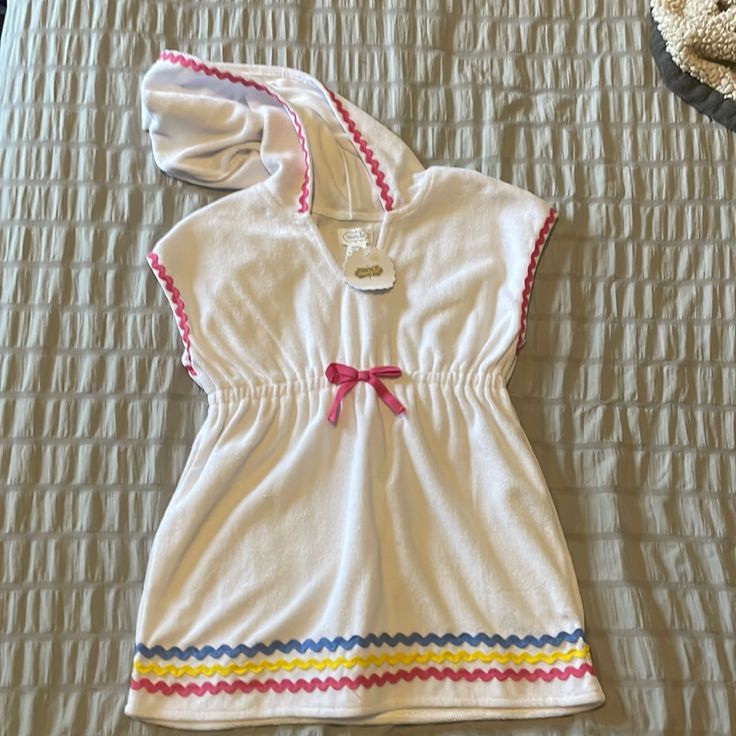 Adorable Swim Coverup With Ricrac Details. Fun White Tops For Sleepover, Playful White Tops For Beach, White Sleeveless Top For Play, Flamingo Swimsuit, Unicorn Swimsuit, Bow Swimsuit, Girls Cover Up, Monogram Robes, Girls Swim