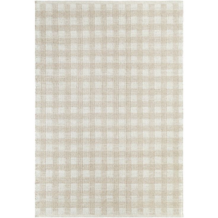 a beige and white checkered rug on a white background