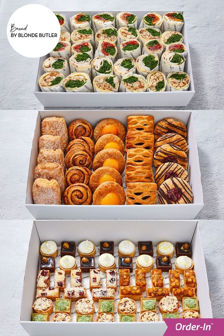 two boxes filled with assorted pastries and desserts next to eachother