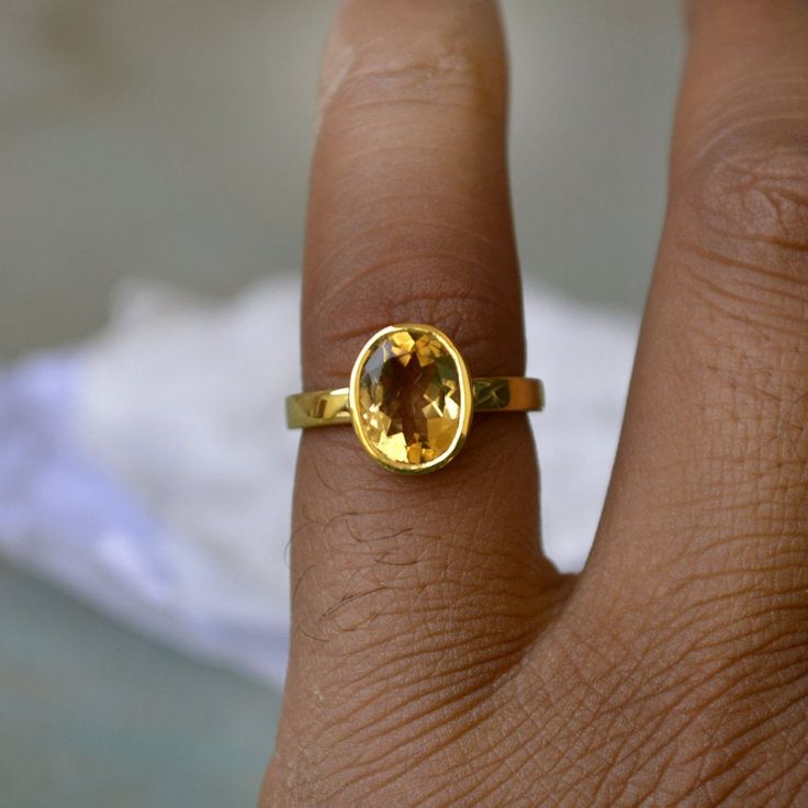 2.4 Carat citrine gold ring, 14K yellow gold citrine ring, Natural citrine cut jewelry, romantic gift ring, gold ring, Wedding gift ring Citrine is said to ignite creativity, aid in decision making, ignite playfulness, support creativity and money making. Physically, citrine is said to support the digestive system and boost metabolism to aid with physical energy and weight loss. The 14K yellow solid gold bezel and solid yellow gold ring are both shined to an extremely high polish. All rings are Peach Morganite Ring, Jasper Ring, Gold Rings Fashion, Citrine Ring, Labradorite Ring, Romantic Gift, Yellow Sapphire, Yellow Gold Rings, Online Jewelry