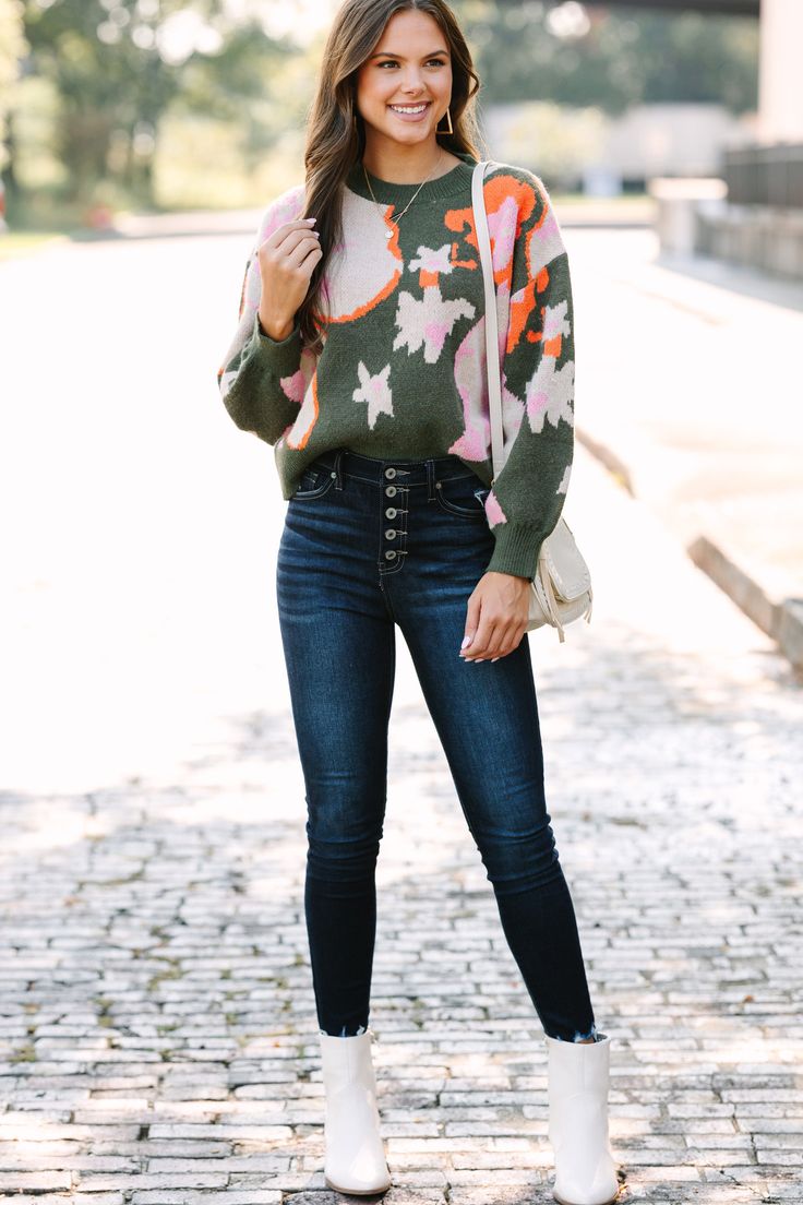 If you are looking for a chic new fall sweater then this is it! That bold floral print and those colors are stunning together! This sweater is perfectly paired with all sorts of jeans and boots or booties! Round neckline Long sleeves Floral print Generous stretch Sydney is wearing the small. Bold Floral Print, Mint Julep Boutique, Floral Sweater, Fall Sweater, Chic Sweaters, Olive Color, Model Fits, Fall Sweaters, Jeans And Boots