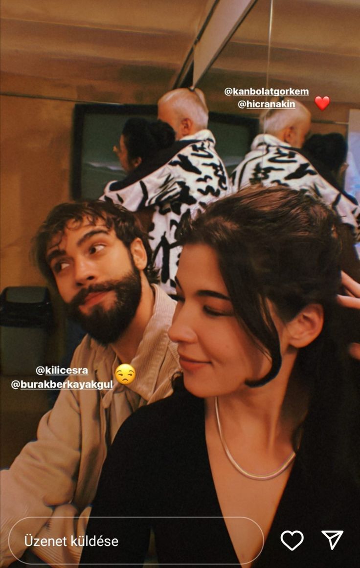 a man and woman sitting next to each other in front of a mirror with the caption on it