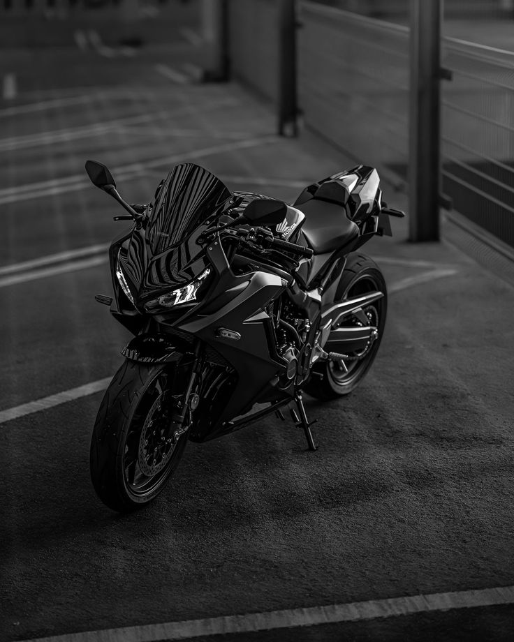 a black and white photo of a motorcycle