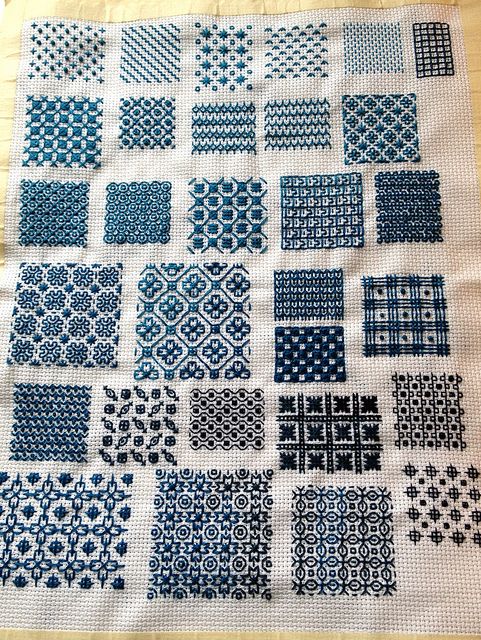 a piece of cloth that has been made with blue and white squares on it,