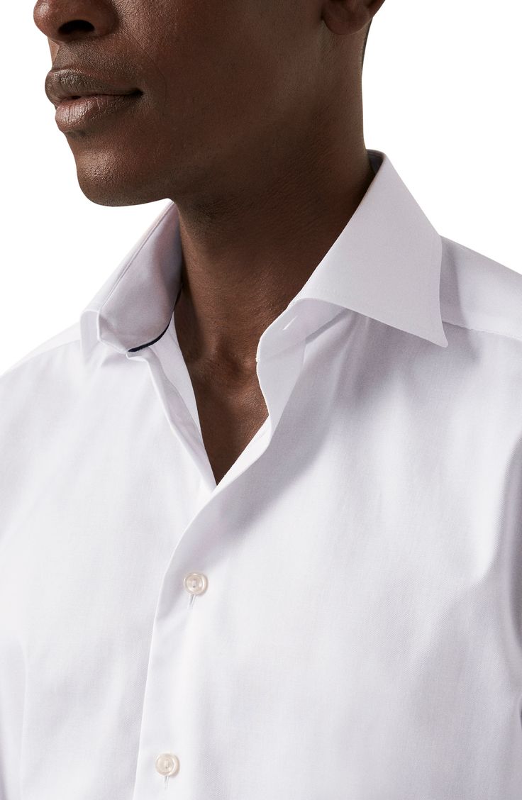 Cut in a slim fit, this sharp dress shirt is constructed from high-performance, crease-resistant cotton and fitted with a classic spread collar. 32" length; 45" chest (size 16.5) French placket Spread collar Mitered, adjustable button cuffs Darts at the back to adjust the width Curved hem 100% cotton Dry clean or machine wash, line dry Imported Formal Cotton Shirt With Lapel Collar, Semi-formal Slim Fit Collared Shirt, Cotton Dress Shirt With Lapel Collar For Formal Occasions, Fitted Shirt With Button Closure And Lapel Collar, White Collared Dress Shirt For Office, Fitted Cotton Shirt With Wrinkle-resistant Finish, Fitted Cotton Shirt With Wrinkle-resistant Feature, Fitted Wrinkle-resistant Cotton Shirt, Wrinkle-resistant Fitted Cotton Shirt