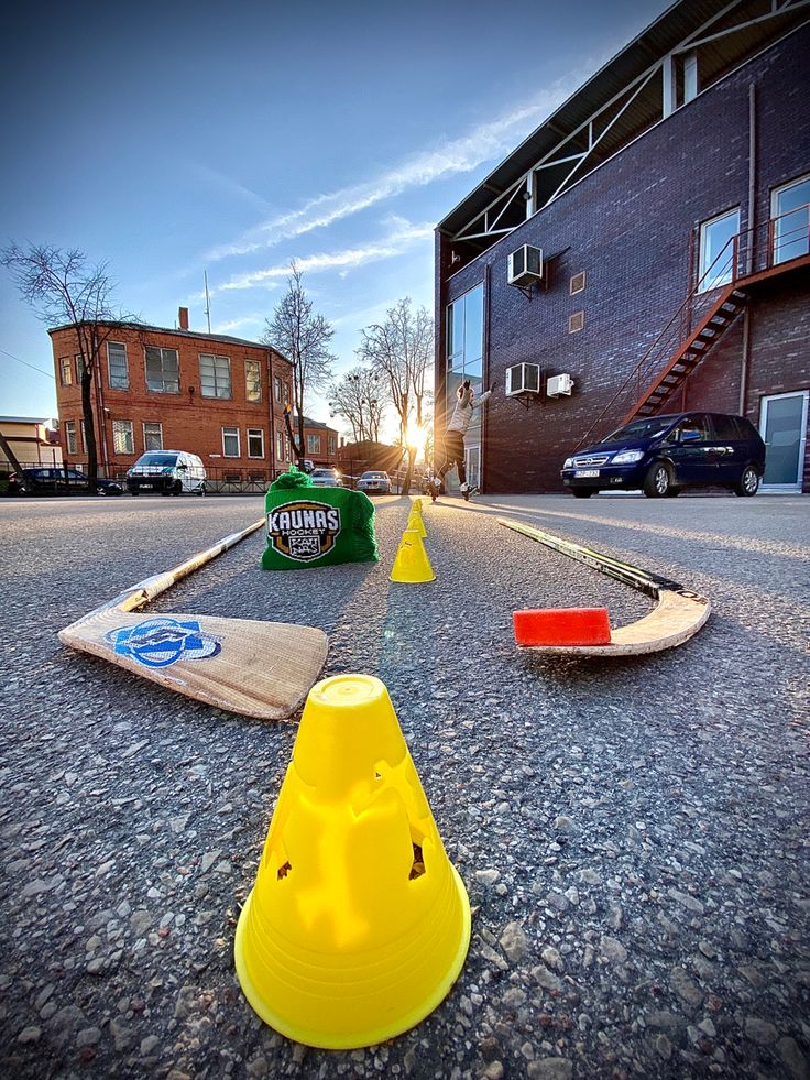 there are some cones and skateboards on the street