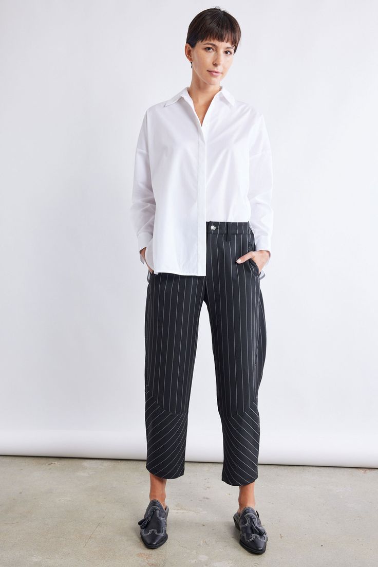 A Pinstripe version of our famous Wide-ish Pants — these pants are a standout yet comfortable pair. Style with your favorite blouse or top for an easy, everyday style. Hits above the ankle Slight stretch Relaxed fit Tapered leg Side pockets Everyday Style, Tapered Legs, Everyday Fashion, Black Pants, White Stripe, Latest Fashion, Fashion Forward, Stripes, Relaxed Fit