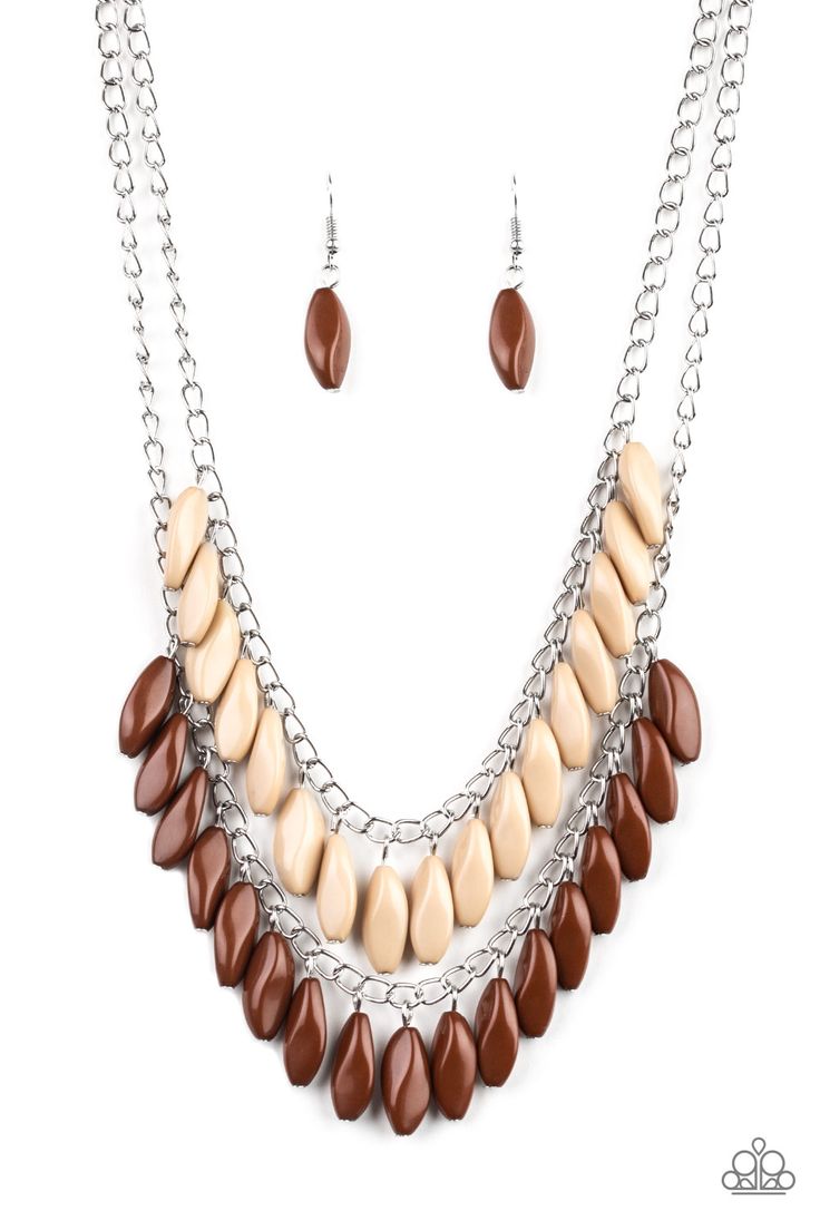 A row of faceted Soybean beads swings above a row of faceted Toffee beads, creating a vivacious double fringe below the collar. Features an adjustable clasp closure.

Sold as one individual necklace. Includes one pair of matching earrings. Brown Necklace Jewelry, Double Fringe, Brown Earrings, Nickel Free Jewelry, Brown Necklace, Buy Bead, Necklace Sets, Fringe Necklace, Women Necklace