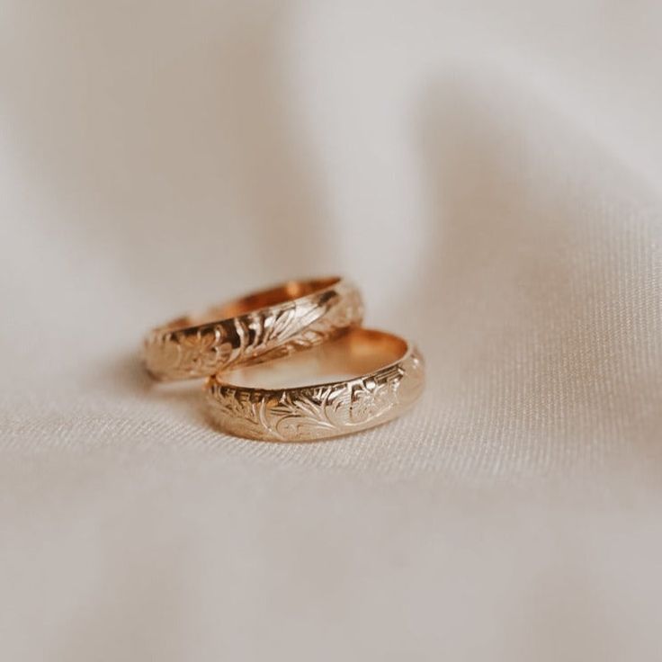 Whether worn alone, or stacked with other styles in our dainty rings range, this beauty adds the right touch of boldness & elegance to any outfit. Each ring features floral raised detailing all around. 14k Gold filled Need help with sizing? Purchase our ring sizer or look at our ring size guide. Please note : Due to the handmade nature of each item, there may be a slight colour variance where the solder seam is Ordering Instructions Select your ring size. Leave us a note in the "Notes to Seller" Heirloom 14k Gold Couple Promise Rings, Classic Promise Toe Rings, Elegant 14k Stamped Midi Rings For Anniversary, Elegant Promise Engraved Ring Tarnish Resistant, Elegant Engraved Promise Toe Ring, Classic Toe Ring For Promise Occasion, Classic Toe Ring For Promise, Elegant Tarnish-resistant Engraved Promise Ring, Open Engraved Ring For Wedding