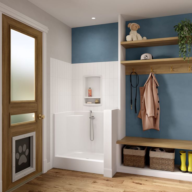 a bathroom with blue walls and wooden floors, including a white bathtub next to a walk in shower