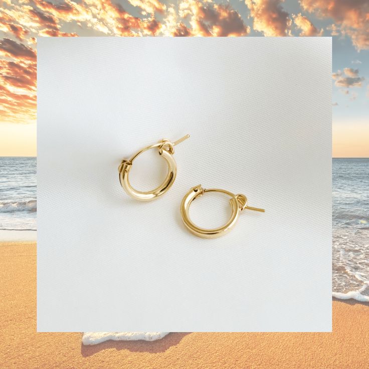 SANTA MARIA HOOP EARRINGS  These gorgeous gold hoop earnings are simple but cute!  Perfect as a gift and for wearing to any occasion - wedding, birthday parties, business events, etc.  −−•−−•−−•−−•−−•−−•−−•−−•−−•−−•−−•−−•−−•−  D E T A I L S   14K gold filled hoop earrings Comes as pair  Hoop size: approximately 13 mm x 12 mm Hoop thickness: approximately 2 mm Simple Small Hoop Tarnish Resistant Huggie Earrings, Simple Tarnish Resistant Small Hoop Huggie Earrings, Simple 14k Gold Huggie Hoop Earrings, Simple 14k Gold Small Hoop Huggie Earrings, Minimalist Tarnish-resistant Huggie Earrings, Minimalist Yellow Gold Hoop Earrings, Simple Hoop Huggie Earrings For Everyday, Minimalist Small Hoop Huggie Earrings, Simple Small Hoop Earrings In Yellow Gold