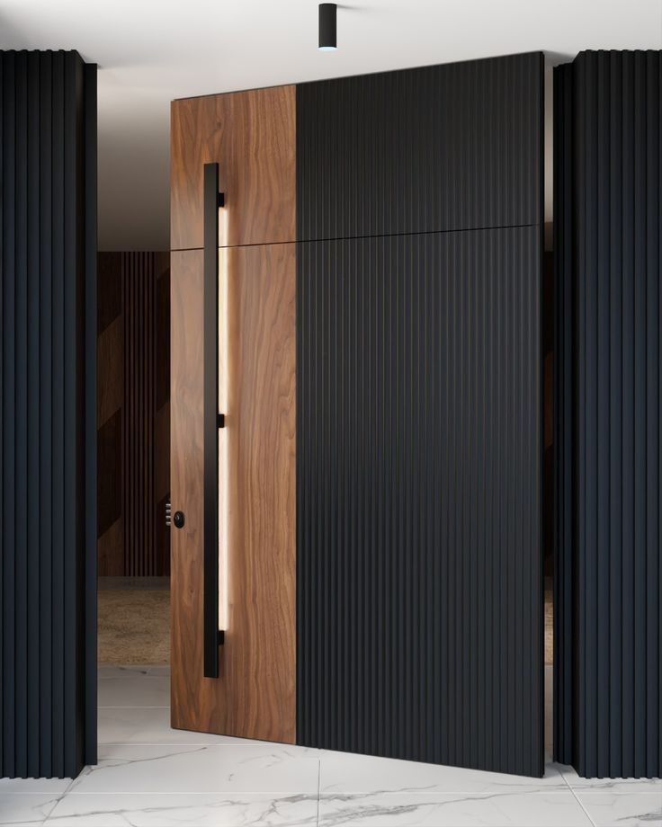 an open wooden door with black slats on the side and white marble flooring