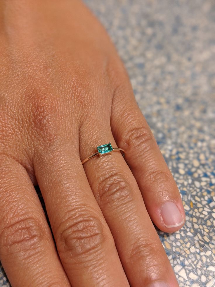 Emerald Ring, Baguette Emerald Ring, 14k Solid Gold Minimalist Emerald Ring, Stacking Emerald Ring, Emerald Jewelry, May Birthstone Delicate and timeless, this baguette cut natural emerald is just a delicate piece of art :) Piece Info: - 14K Gold (You can choose gold type) - Comfort Fit - Hypoallergenic, Cobalt-Free - Sleek Design - Durable - Comes in a Gift box - Width : ~1mm Main gemstone Information: Type: Natural Green Emerald Cut : Baguette Cut Size : 5mm X 3mm *All sizes are available - pl Dainty 14k Gold Emerald Cut Birthstone Ring, Dainty 14k Gold Birthstone Ring With Emerald Cut, May Birthstone Baguette Cut Diamond Rings, Minimalist 14k Gold Emerald-cut Birthstone Ring, Minimalist 14k Gold Emerald Cut Birthstone Ring, Minimalist Emerald Cut May Birthstone Ring, Minimalist May Birthstone Ring With Emerald Cut, Everyday Minimalist Emerald Cut Ring, 14k Gold Baguette Cut Emerald Ring For May Birthstone