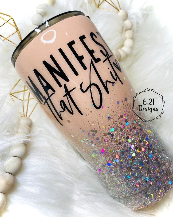 a pink and gold glitter tumbler with the words nannies that slay on it