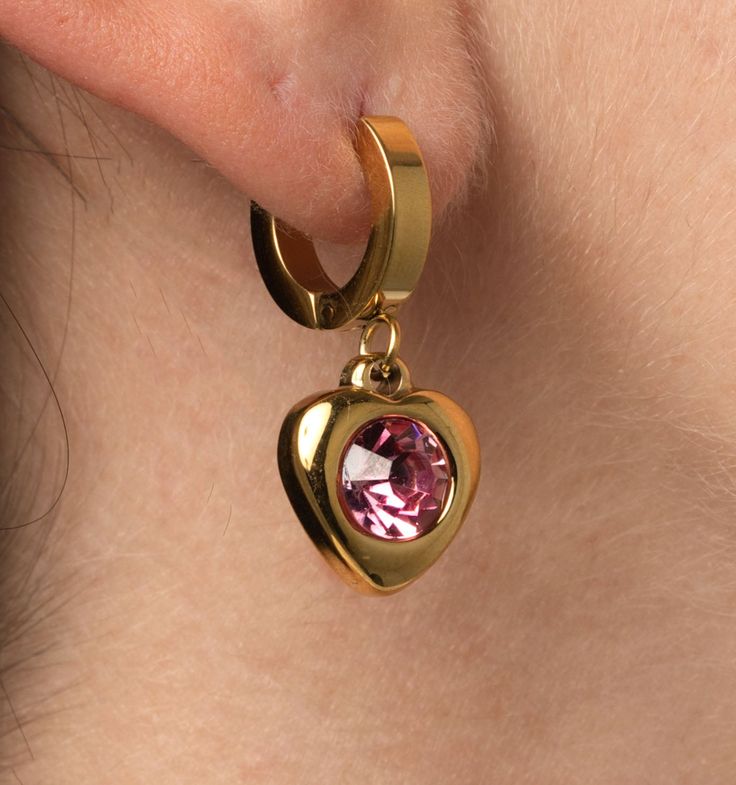 These pink heart earrings will be your new favorite everyday earrings. Classic, sparkly, and feminine, these huggie hoops make a simple statement as your sweetest new accessory.
Hoop size: 12mm, Heart: 12mm Pink Huggie Heart Earrings, Pink Huggie Pierced Jewelry, Pink Heart Charm Hoop Earrings For Valentine's Day, Pink Hoop Earrings With Heart Charm For Valentine's Day, Valentine's Day Small Hoop Huggie Earrings With Heart Charm, Pink Heart-shaped Everyday Jewelry, Everyday Pink Heart-shaped Jewelry, Pink Heart Charm Huggie Jewelry, Pink Huggie Jewelry With Heart Charm