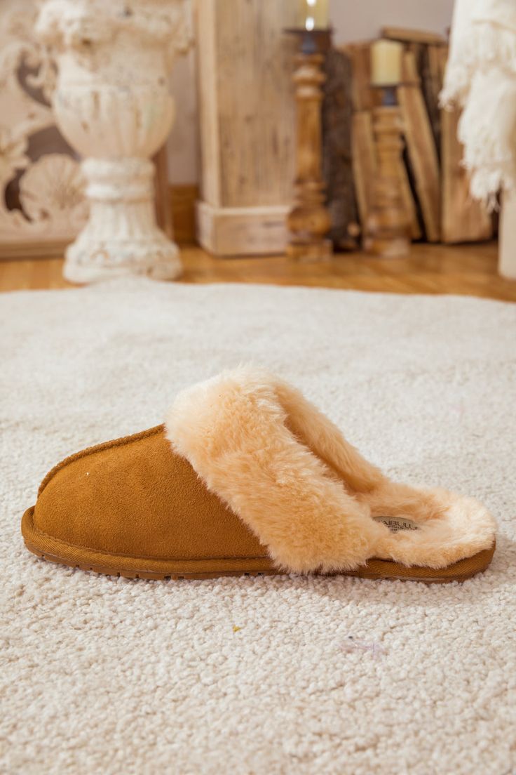 Deliver convenient slip-on comfort to their weekend mornings with these soft suede slippers designed with a cozy wool lining and durable rubber sole for indoor/outdoor use. Pairs perfectly with our snug fleece lounge sets. 0.78'' heel Slip-on 100% leather upper 100% Wool lining Rubber sole Feature: Lightweight, ultra-soft fully woolen lined, anti-skid rubber sole. Comfy Brown Indoor Slippers, Cozy Brown Slippers With Textured Footbed, Brown Indoor Slippers With Cushioned Footbed, Brown Cushioned Indoor Slippers, Super Soft Comfortable Brown Slippers, Super Soft Slip-on Slippers For Indoor Use, Comfy Super Soft Brown Slippers, Soft Casual Sheepskin Slippers, Brown Suede Indoor Slippers