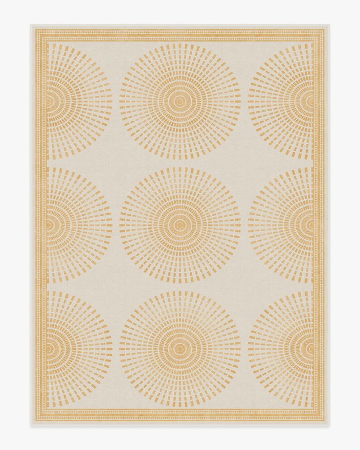 a beige and yellow area rug with circles on the bottom, in front of a white background