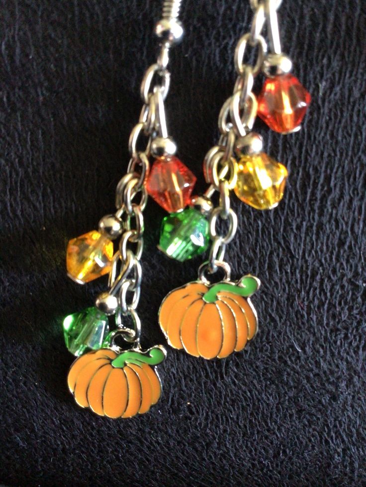 (13,034) Autumn Earrings  Made from stainless enamel, glass beads and stainless steel chain  A) Maple Leaf with Beads B) Pumpkin with orange, yellow and green beads C) Pumpkin with yellow, red and orange beads Orange Beaded Chain Jewelry For Gift, Orange Dangle Jewelry With Dangling Beads, Orange Czech Glass Dangle Earrings, Orange Jewelry With Dangling Beads, Orange Enamel Dangle Jewelry, Orange Czech Glass Beaded Jewelry, Nickel-free Yellow Dangle Beaded Earrings, Nickel Free Yellow Dangle Beaded Earrings, Orange Metal Earrings