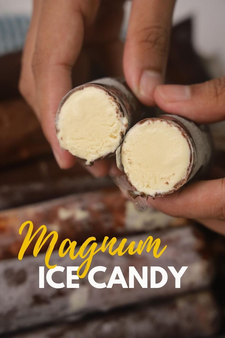 two hands holding an ice cream candy in front of the words, magnim ice candy