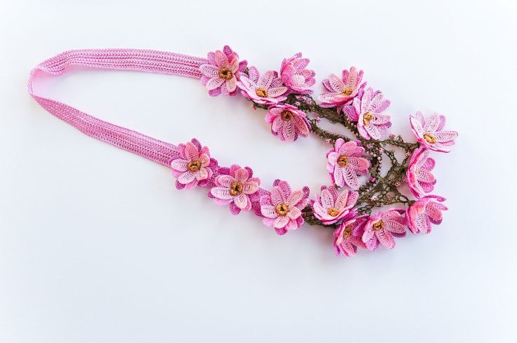 This beautiful piece is made from floral lace. This necklace is comfortable to wear and adds a touch of elegance to any outfit. Our floral necklace is the perfect choice for any occasion. The delicate lace and stunning flowers will impress anyone on your list! Whether you're looking to add a touch of elegance to your outfit or show your loved one how much you care, this flower necklace is sure to please. 🪡 PRODUCT DETAILS: * Materials: Oya, Needlework, Point lace * Durable design, high-quality craftsmanship * Perfect gift for women (mother, wife, girlfriend, daughter, granddaughter) 🪡 SHIPPING:All orders will be processed in standard 3-5 business days and will be shipped using USPS First-Class mail which generally arrives in 2-6 business days. Follow us on Instagram (https://www.instagra Bohemian Flower Necklace For Weddings, Feminine Flower Pendant Necklace, Bohemian Flower Pendant Necklace For Wedding, Delicate Flower Necklace For Party, Handmade Flower Necklaces For Party, Elegant Handmade Spring Jewelry, Elegant Flower Charm Necklace For Spring, Handmade Choker Necklace For Spring, Elegant Flower Necklace For Spring